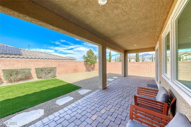 view of patio featuring a fenced backyard