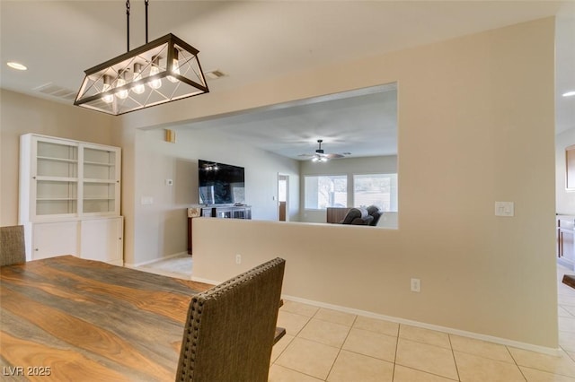 dining area with baseboards, a chandelier, ceiling fan, light tile patterned flooring, and recessed lighting