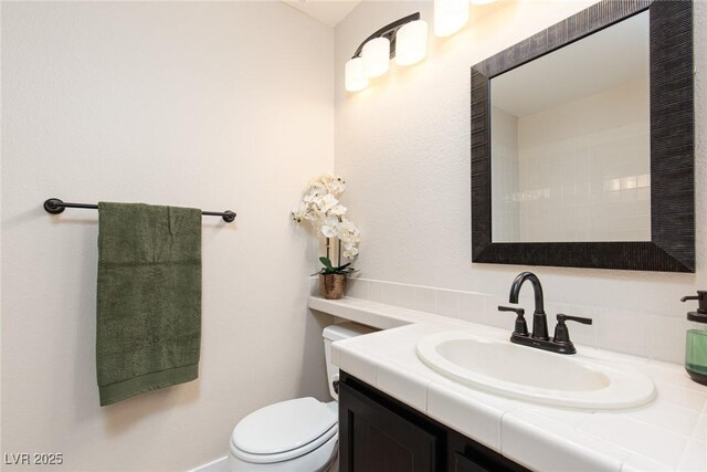 9404 Calico Garden Ave, Las Vegas, NV 89134 - bathroom featuring vanity and toilet