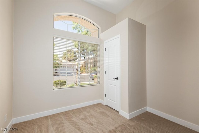 9404 Calico Garden Ave, Las Vegas, NV 89134 - unfurnished room featuring light carpet and baseboards