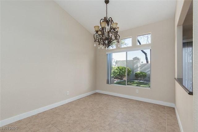 9404 Calico Garden Ave, Las Vegas, NV 89134 - spare room featuring a chandelier, baseboards, light tile patterned flooring, and lofted ceiling