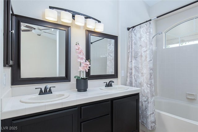 9404 Calico Garden Ave, Las Vegas, NV 89134 - bathroom featuring double vanity, shower / tub combo with curtain, and a ceiling fan