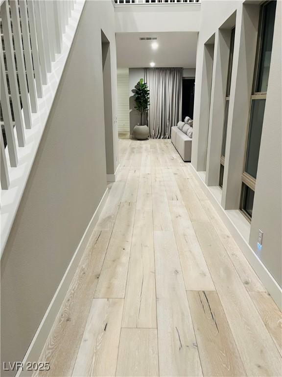 10280 Midnight Meteor Ave, Las Vegas, NV 89166 - hallway featuring hardwood / wood-style floors