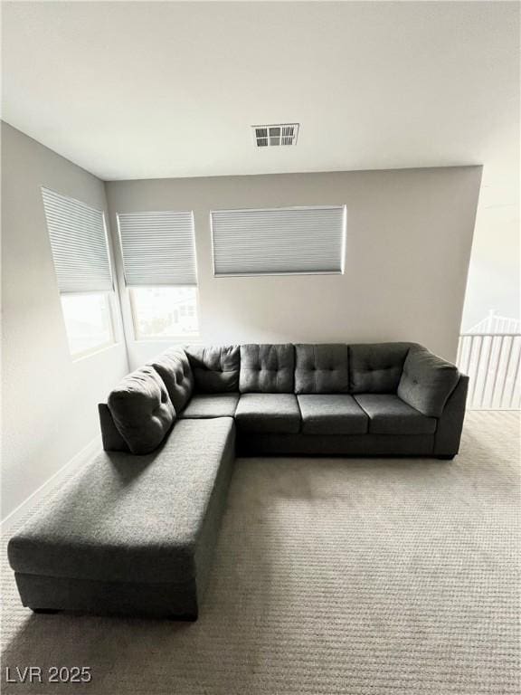 10280 Midnight Meteor Ave, Las Vegas, NV 89166 - carpeted living area with baseboards