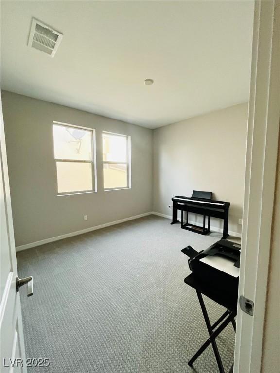 10280 Midnight Meteor Ave, Las Vegas, NV 89166 - unfurnished office featuring carpet flooring and baseboards