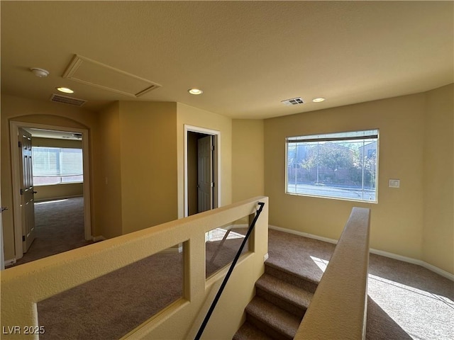 stairway with carpet flooring, recessed lighting, and baseboards