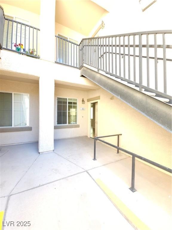4675 Basilicata Ln Unit 103, North Las Vegas, NV 89084 - view of patio / terrace with a balcony