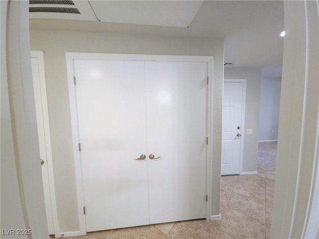 4675 Basilicata Ln Unit 103, North Las Vegas, NV 89084 - hall featuring light tile patterned flooring and baseboards