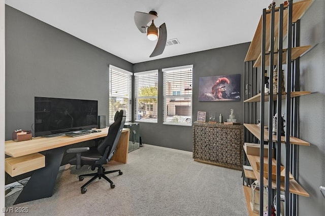 6834 Fallen Rock St, North Las Vegas, NV 89084 - carpeted home office with a ceiling fan and baseboards