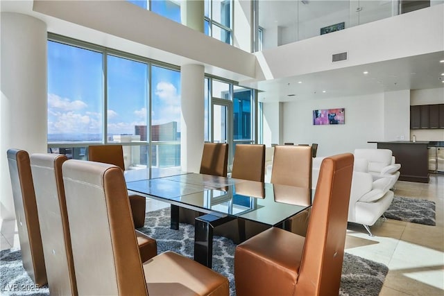 2700 S Las Vegas Blvd Unit 4305, Las Vegas, NV 89109 - dining space featuring tile patterned floors and a high ceiling