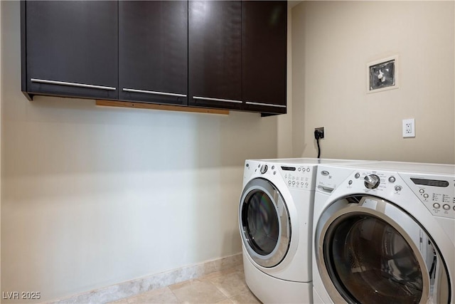 2700 S Las Vegas Blvd Unit 4305, Las Vegas, NV 89109 - washroom with cabinet space, washing machine and dryer, and baseboards