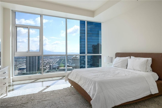2700 S Las Vegas Blvd Unit 4305, Las Vegas, NV 89109 - bedroom featuring multiple windows and a city view