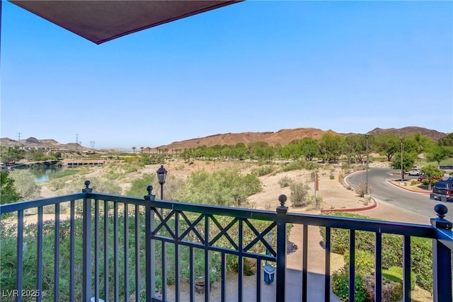 balcony featuring a mountain view