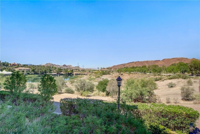 mountain view featuring a large body of water