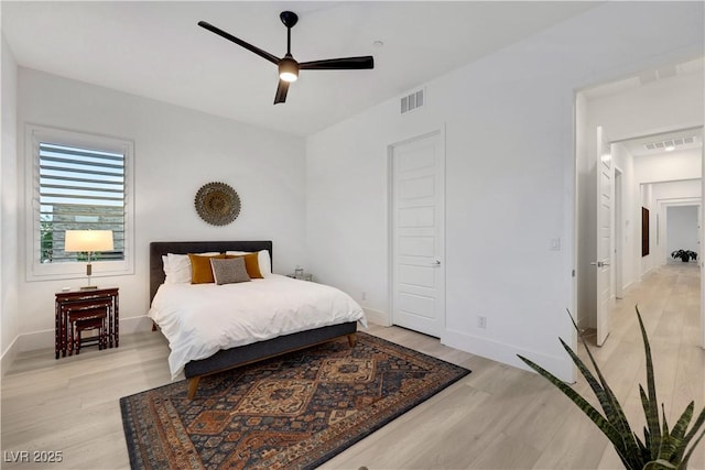 11895 Skyline Arch Ct, Las Vegas, NV 89138 - bedroom with light wood-type flooring, baseboards, and a ceiling fan