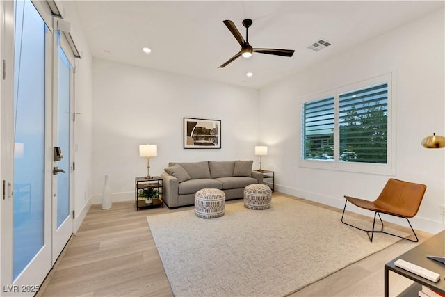 11895 Skyline Arch Ct, Las Vegas, NV 89138 - living room featuring a ceiling fan, light wood finished floors, baseboards, and recessed lighting