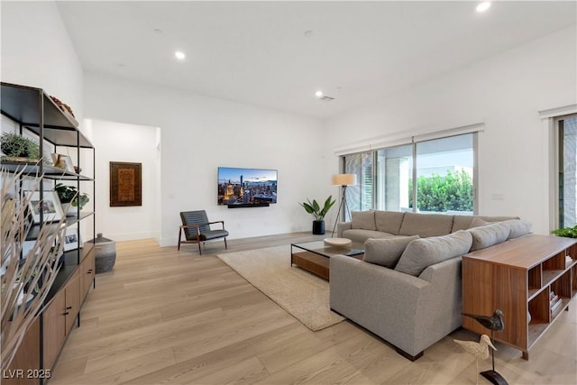 11895 Skyline Arch Ct, Las Vegas, NV 89138 - living room with light wood-style flooring and recessed lighting
