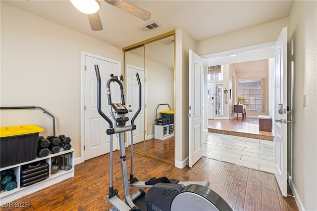 5449 Desert Spring Rd, Las Vegas, NV 89149 - workout area featuring wood finished floors, a ceiling fan, and baseboards