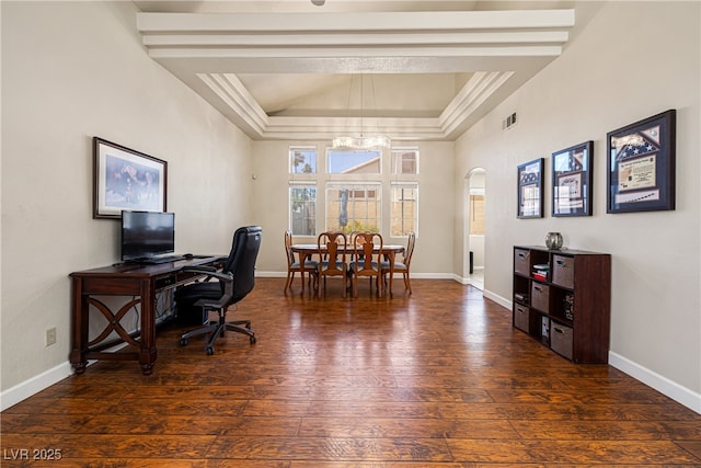 5449 Desert Spring Rd, Las Vegas, NV 89149 - office featuring a tray ceiling, hardwood / wood-style flooring, arched walkways, baseboards, and a chandelier