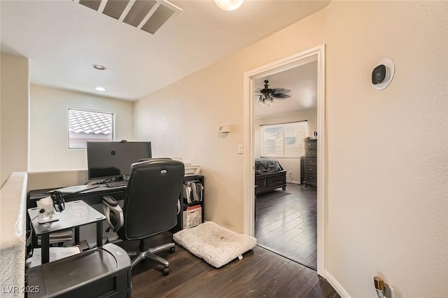 office area featuring wood finished floors and baseboards