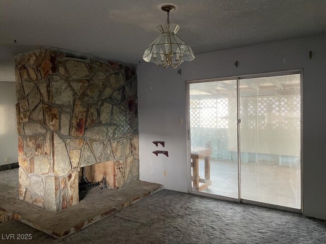 204 Bradshaw Way, Las Vegas, NV 89145 - unfurnished living room featuring carpet flooring, a chandelier, a textured ceiling, and a fireplace