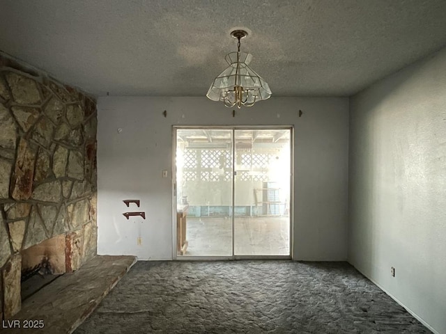 204 Bradshaw Way, Las Vegas, NV 89145 - unfurnished dining area with a chandelier, a textured ceiling, and carpet