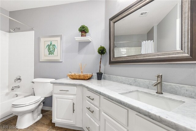 full bathroom with vanity, toilet, shower / tub combo with curtain, and tile patterned floors