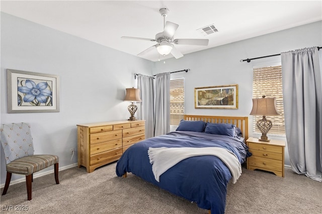 bedroom with carpet floors, ceiling fan, and baseboards
