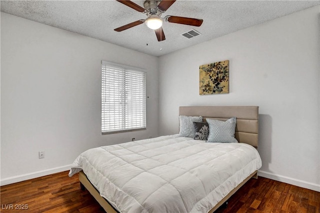 4990 Spring Oak St, Las Vegas, NV 89120 - bedroom featuring baseboards, wood finished floors, a textured ceiling, and ceiling fan