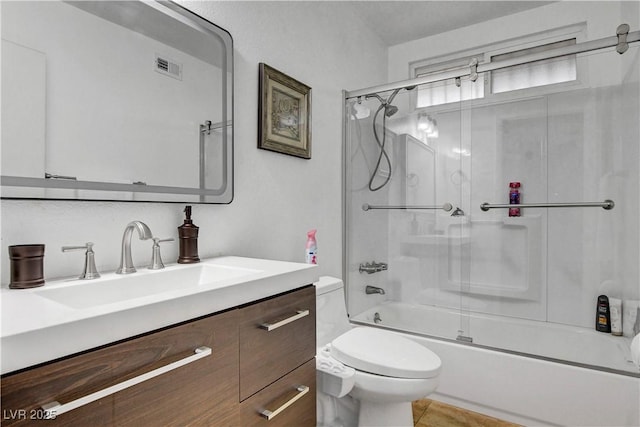 4990 Spring Oak St, Las Vegas, NV 89120 - full bath featuring toilet, vanity, and bath / shower combo with glass door