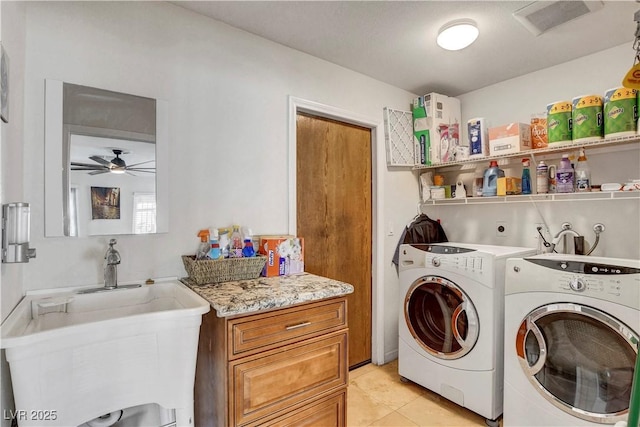 4990 Spring Oak St, Las Vegas, NV 89120 - laundry area with independent washer and dryer, ceiling fan, and light tile patterned floors