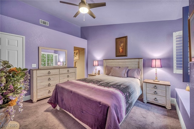 2725 S Nellis Blvd Unit 2052, Las Vegas, NV 89121 - carpeted bedroom with vaulted ceiling, baseboards, and a ceiling fan