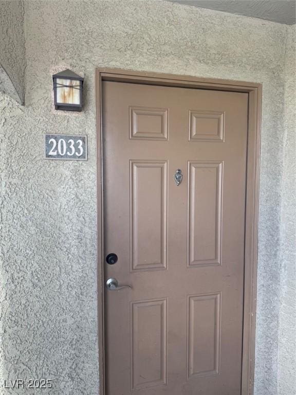 4400 S Jones Blvd Unit 2033, Las Vegas, NV 89103 - view of exterior entry with stucco siding