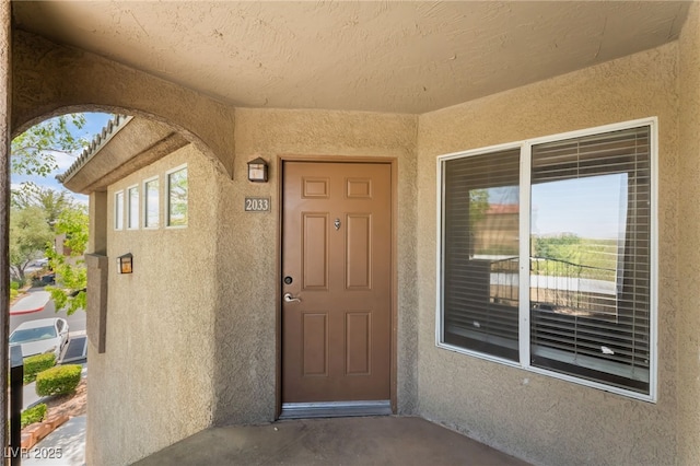4400 S Jones Blvd Unit 2033, Las Vegas, NV 89103 - doorway to property with stucco siding