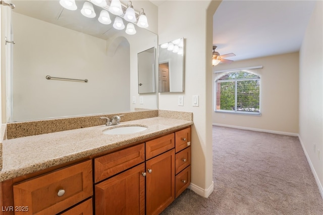 4400 S Jones Blvd Unit 2033, Las Vegas, NV 89103 - bathroom with vanity, a ceiling fan, and baseboards
