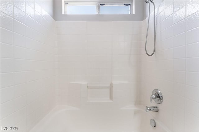 full bath featuring  shower combination