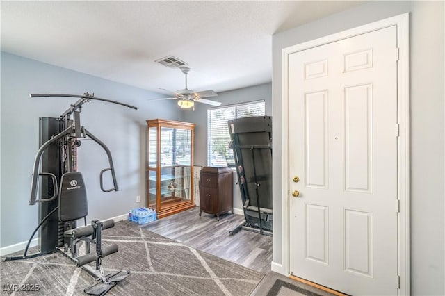5024 Granite Creek Ct, Las Vegas, NV 89131 - exercise room featuring baseboards, ceiling fan, and wood finished floors