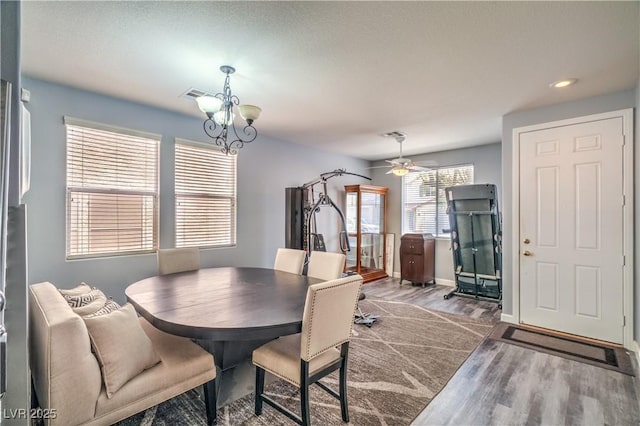 5024 Granite Creek Ct, Las Vegas, NV 89131 - dining area with wood finished floors, a chandelier, baseboards, ceiling fan, and recessed lighting