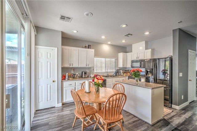 5024 Granite Creek Ct, Las Vegas, NV 89131 - kitchen featuring black appliances, white cabinetry, a center island, dark wood-style floors, and recessed lighting