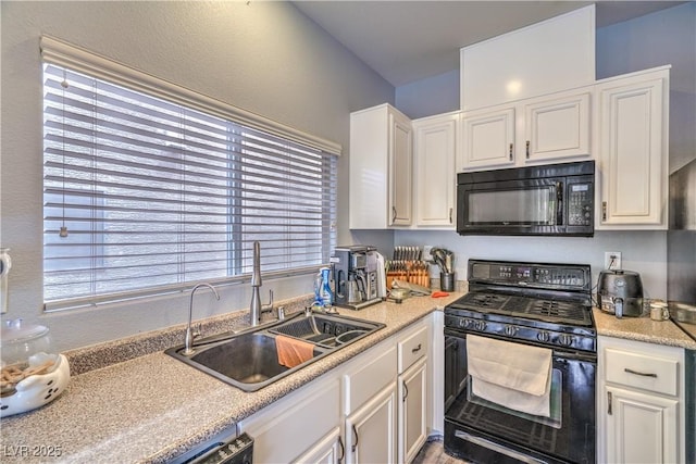 5024 Granite Creek Ct, Las Vegas, NV 89131 - kitchen featuring black appliances, a sink, light countertops, and white cabinetry