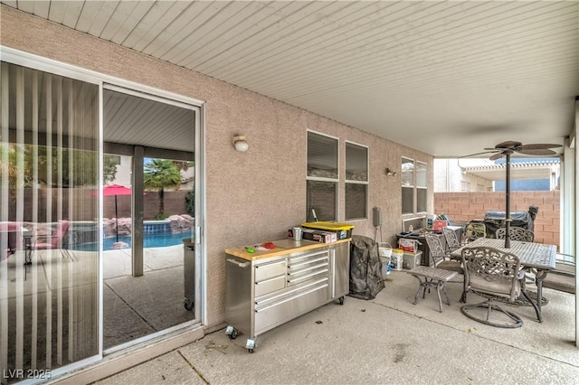 5024 Granite Creek Ct, Las Vegas, NV 89131 - view of patio / terrace featuring fence, ceiling fan, and outdoor dining area