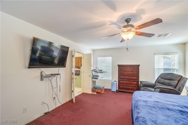 5024 Granite Creek Ct, Las Vegas, NV 89131 - bedroom with multiple windows, dark colored carpet, a ceiling fan, and baseboards