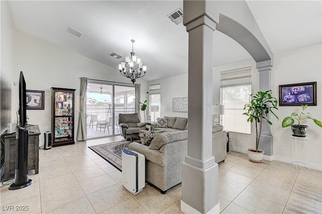 8250 Lincoln Valley St, Las Vegas, NV 89123 - living area with lofted ceiling, plenty of natural light, a chandelier, and light tile patterned floors