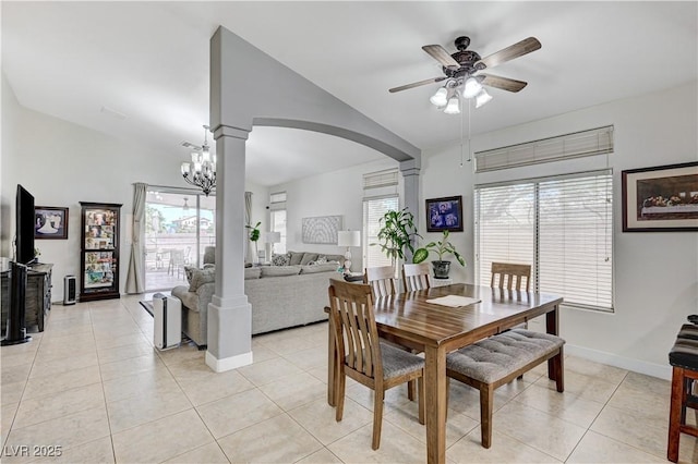 8250 Lincoln Valley St, Las Vegas, NV 89123 - dining space with arched walkways, ceiling fan, vaulted ceiling, plenty of natural light, and light tile patterned floors