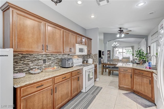 8250 Lincoln Valley St, Las Vegas, NV 89123 - kitchen with white appliances, backsplash, a ceiling fan, recessed lighting, and light tile patterned flooring