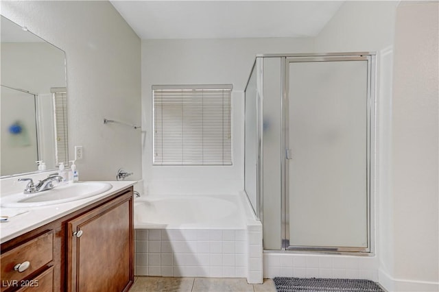 8250 Lincoln Valley St, Las Vegas, NV 89123 - bathroom featuring a stall shower, vanity, a garden tub, and tile patterned flooring