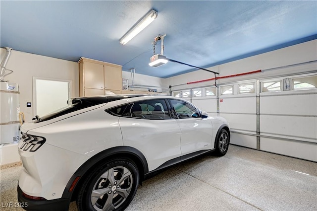 8250 Lincoln Valley St, Las Vegas, NV 89123 - garage with water heater and a garage door opener