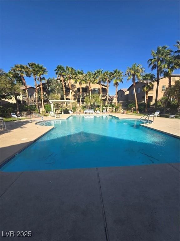 8985 S Durango Dr Unit 1154, Las Vegas, NV 89113 - community pool featuring a patio area