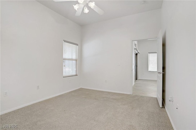 8985 S Durango Dr Unit 1154, Las Vegas, NV 89113 - spare room with light carpet, a ceiling fan, and baseboards