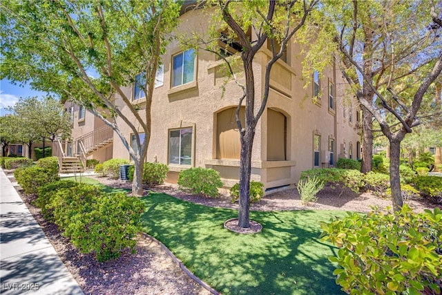 8985 S Durango Dr Unit 1154, Las Vegas, NV 89113 - view of building exterior featuring stairs